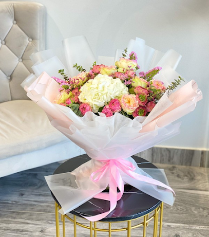 زهور السوسن والقهوة - عجمان - +971 50 303 3908