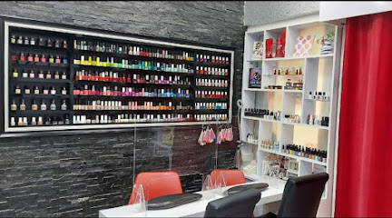 نورا حمدي بيوتي لاونج - دبي - +971 6 525 2112