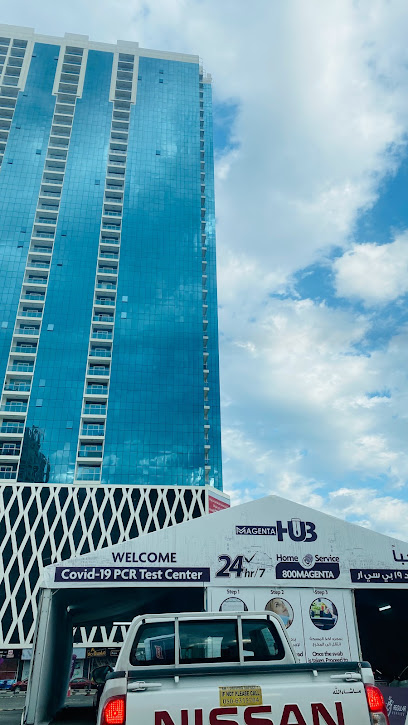 قم بقيادة Magenta HUB من خلال مركز فحص اختبار COVID 19 PCR - United Arab Emirates|Al Rashidiya 1 - Ajman|Sheikh Rashid Bin Saeed Al Maktoum St beside Oasis Tower 1