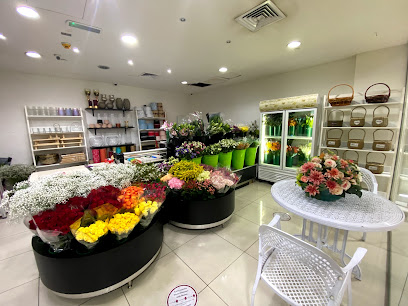 متجر زهور الدفلى - عجمان - +971 2 677 3131