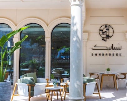 مطعم شبابيك - دبي - +971 6 554 0444