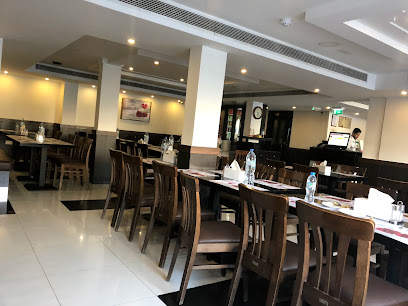 مطعم كاليكوت نوتبوك - دبي - +971 6 561 8338