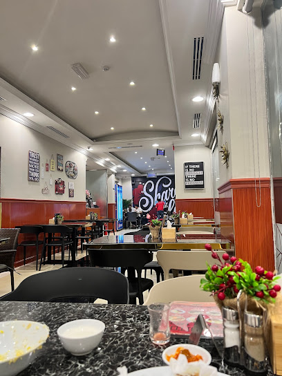 مطعم تيستي ستيشن - United Arab Emirates|Al Majaz - Al Majaz 2 - Sharjah|near Pizza Hut|Al Wahda St
