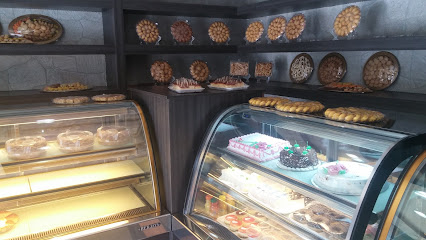 مخابز ومعجنات حكاية - أبو ظبي -