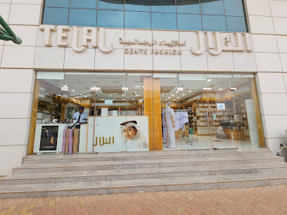 أزياء التلال الرجالية ذ م م ، ملابس عربية تقليدية ، كندورة ، محل كندورة العين - أبو ظبي - +971 3 755 0323