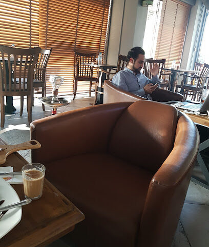 مقهى تي جنكشن - عجمان - أبو ظبي - +971 6 740 0920